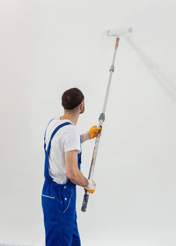 Interior painting professional from Best Painting LA applying smooth white paint for a clean finish in Los Angeles, CA