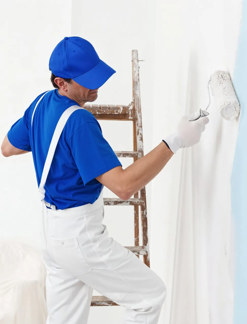 Professional painter applying interior wall paint, showcasing quality workmanship by Best Painting LA in Los Angeles, CA