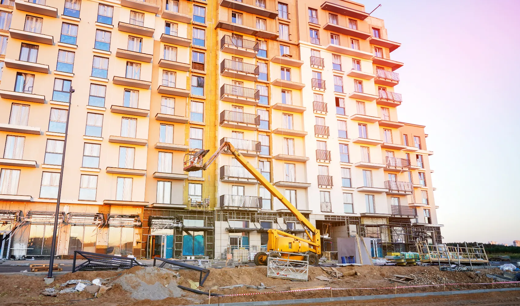 Large HOA exterior painting service for apartment complex with scaffolding and lift access in Los Angeles